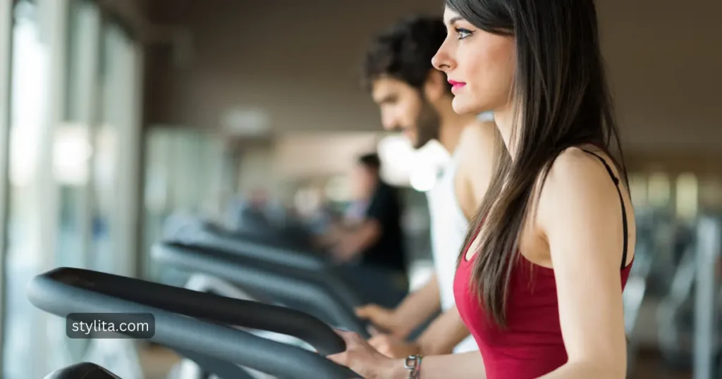 beautiful lady on the tread mill for cardio exercise training