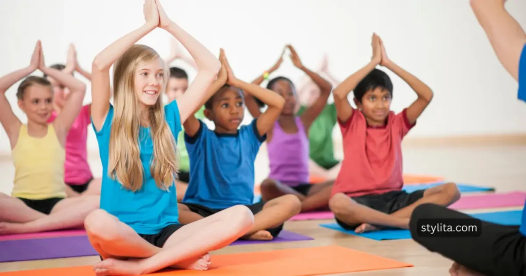 young girls attending yoga class