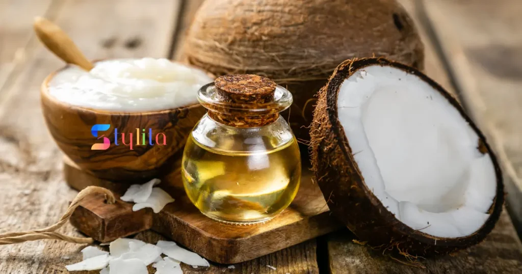 coconut oil in a bottle with cork and some coconut pieces placed by the side